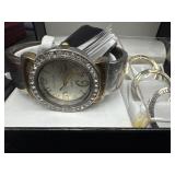 Waltham watch features a rhinestone bezel on a
