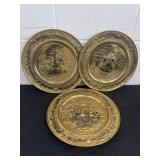 Three 14' vintage 1970s repoussé brass wall plate