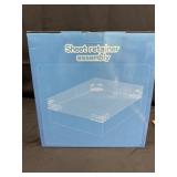 New sheet retainer assembly