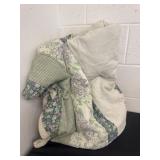 Green and purple floral quilt