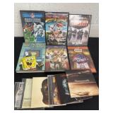 Group of dvds and CDs