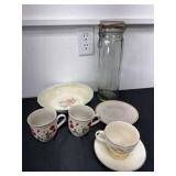Canister and bowl with cups and cup and saucer