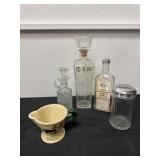 Decanters and shakers and bottles and creamer