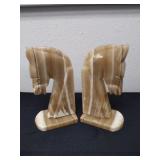 Set of 9 in carved Stone horse head bookends