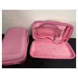 2 pink carry cases