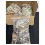 Box of fake leafs a a bag of seeds