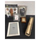 Group of picture frames and dog paw pads