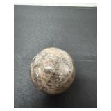 2' sphere appears to be made of peach moonstone,