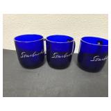 3 blue Starbucks coffee cups