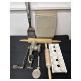 Group of kitchen item rolling pins meat grinder