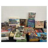 Large group of puzzles , see pics