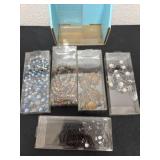 5 necklaces with containers