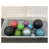 Group of exercise balls, all different weights