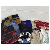 Group of college and state shirts