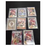 Eight 49er football cards