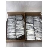 2 boxes of  unlabeled metal mint tins