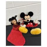 Group of Mickey Mouse bag and sock plush