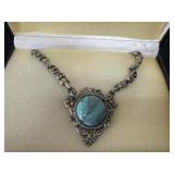 silver-tone ornate filigree medallion necklace