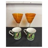 2 glass cups and 2 golfer mugs