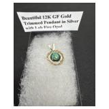Beautiful 12k gf gold trimmed pendant in silver
