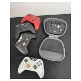 Group of Xbox controllers
