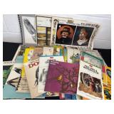 Group of drawing books and koda books and more