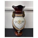 15ï¿½ two-handled ceramic vase features a rich