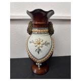 15ï¿½ two-handled ceramic vase features a rich
