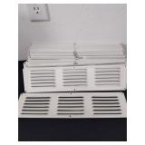 Sixteen 16x4-in White vent covers with mesh