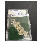 Vintage Marvella brooch no stones misisng