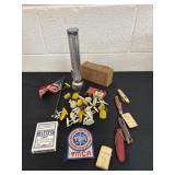 Group of pocket knifes, toys and flash light.