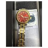 ORUSS quartz watch features a striking red dial