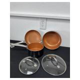 3 pans with lids