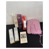Group of serums and make up brushes. Nails and