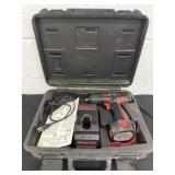 Snap on drill with battery and charger with case