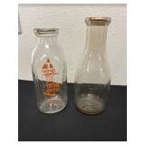 2 vintage milk bottles