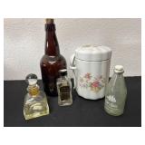 Canister with 4 glass bottles