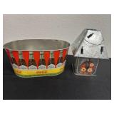 Coca Cola tin with lantern