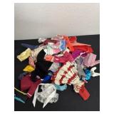 Group of Barbie clothes