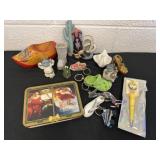 Group of key chains and figurines