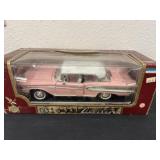 pink 1:18 scale die-cast model car