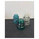 Rare, dark green electrical insulators with more