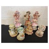 Group of angels and mouse figurines