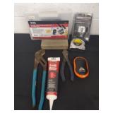 Tire repair kit, file, measuring tape, tools and