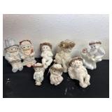 Group of dreamsicle figurines some have chips