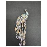 vintage-style crystal peacock brooch