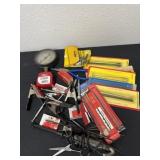Box of tools with several new scroll, saw blades