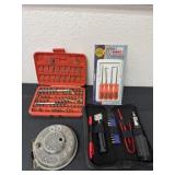 Box of screw, bits, and cases