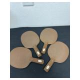 Four Harvard ping-pong paddles