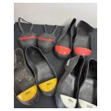 4 pairs of Uline rubber shoe covers all different